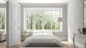 Elegant windows over a bed